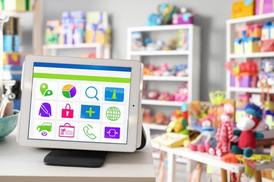 Gift shop with POS software on tablet.