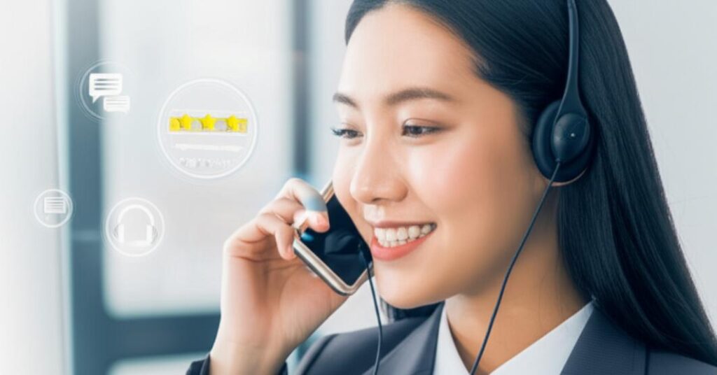 Nâng Tầm Trải Nghiệm Khách Hàng: Bí Quyết Chăm Sóc Khách Hàng Vượt Trội 2 Nhân viên dịch vụ khách hàng chuyên nghiệp, thân thiện giao tiếp với khách hàng.