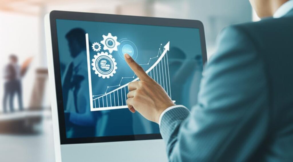 Hình ảnh người quản lý xem biểu đồ tăng trưởng, cạnh tranh và thành công trong kinh doanh.