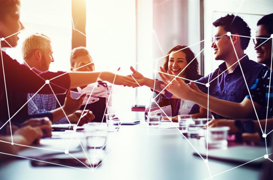 Diverse individuals in a collaborative dialogue session.